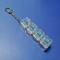 Transparent 4-key mechanical switch tester keychain fidget toy with blue switches. - With LED Lights / 4-Key Transparent