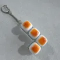 Llavero creativo en forma de L con teclas de huevo frito y switches mecánicos claros - Cuatro Teclas en L / Efectos de Luz RGB / Pan de Caramelo