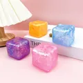 Detailed view of colorful maltose water cube squishy toys in four vibrant colors - Glitter Cube Shape / 5cm Size