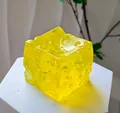 Yellow translucent maltose stress ball cube squishy toy with porous cheese texture - Cheese Ice Cube [Yellow] OPP Bag