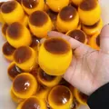 Detailed macro view of a soft caramel pudding squishy toy for stress relief and fun - Caramel Pudding Style (Crunchy Block Version) / Individual Packaging / Caramel / Yellow