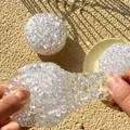 Pelota antiestrés transparente y maleable con textura interna de cuentas de hielo - Bola de Luz de Luna Blanca