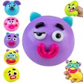 Kleurrijke squishy speeltjes met cartoon gezichten voor stressverlichting en langzaam herstel. - Paars