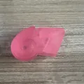 Close-up detail of the pink translucent 67-shaped squishy toy for stress relief - Pink