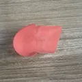 Macro view of a pink translucent glittery '67' shaped TPR squishy decompression toy - Orange