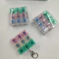 Detailansicht bunter mechanischer 9-Tasten-Fidget-Spielzeuge mit Schlüsselanhängern. - 9-Tasten-Matrix Leuchttasten-Stil