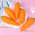 Close-up detail of the soft texture and vibrant orange color of carrot squishy toys. - Expressionless Carrot / Orange