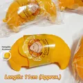Detailed view of croissant squishy stress relief toy with 11cm length and pendant hole - Croissant Style