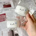 Gros plan d'un mignon jouet à presser en forme de brioche à la vapeur mignonne - Petit Pain en Sueur Squishy
