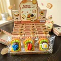 Ensemble de jouets spongieux en forme de pain dans une boîte pour soulager le stress - Nourriture Simulée Squishy / Toast en Boîte