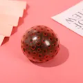 Red translucent stress relief squeeze grape ball with black dot pattern and TPR devil beads - 1 Piece / Red With Black Beads