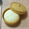 Slow rebound silicone simulation baozi bun squeeze toy with a plastic steamer basket - 5.5cm Small Size (With Steamer) / Off White