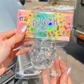 Macro detail of a clear cat paw squishy toy with white pearl decorative beads. - Card Head PVC Bag / Ice Crystal Transparent Large Cat Paw