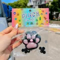 Detailed view of a pink and black cat paw squishy toy in colorful packaging - Card Head PVC Bag / Black With Pink Dots Large Cat Paw