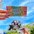Close-up of a large cat paw pinch toy in clear packaging with a vibrant header - Card Head PVC Bag / Black With White Dots Large Cat Paw