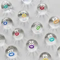 Detailed view of clear silicone squishy toys featuring cute cartoon facial expressions - Emoji Squishy (001) / 1 Piece / Multicolor Transparent