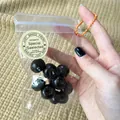 Close-up of simulation blueberry squishy toy in a mini transparent bag with orange chain. - Blueberry (Vintage Label) / 12 Pendants Set