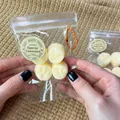 Handheld bag of four realistic mini fruit squishies for decompression and sensory play - Banana / 4Pcs