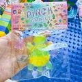 Set di giocattoli antistress a forma di tartaruga trasparente con confezione colorata - Famiglia di Quattro Tartarughe / Giallo