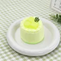Macro detail of a realistic coconut cake squishy toy made from food-grade silicone - Coconut Cake / Fluorescent Green