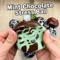 Close-up macro view of mint dark chocolate crispy skin stress relief squeeze toy - Mint Crispy Ball / Mint Green