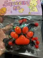 Giocattolo antistress zampa di gatto da 7 cm in confezione protettiva di plastica - Stile Paillettes Cuscinetto Rosso-Arancio Su Fondo Nero / Zampa di Gatto Nera e Rossa