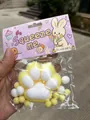Handheld 7cm soft yellow and white cat paw squeeze toy with cute rabbit packaging - Large Flocked Style / Yellow Cat Paw