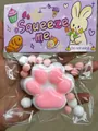 7cm ροζ πατούσα γάτας squishy παιχνίδι σε συσκευασία με πομ πομ - Λευκό και Ροζ (Λείο)