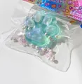 Großes glitzerndes Katzenpfoten-Squishy Spielzeug mit Perlen zur effektiven Stressbewältigung - Grüne Katzenpfote / Grüner Kristall Katzenpfote