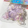 Jouet squishy patte de chat violet à paillettes avec perles pour soulager le stress - Grande Patte de Chat (Violet)