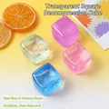 Set of colorful transparent squishy ice cube stress relief toys on a vibrant yellow surface - Solid Transparent Cube (Boxed) / 5.50cm