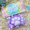 Soft purple flocked cat paw squishy toy for stress relief in decorative Pinch Family pack - Plush Cat Paw Purple