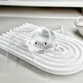 Makroansicht von transparentem Oktopus-Squishy-Spielzeug in einer Plastiktüte zum Stressabbau - Transparent
