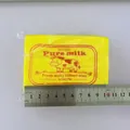 Simulation butter-style squeeze toy in yellow, shown with a metal ruler for size - Milk Brick Style / 8cm / White