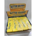 Variante di giocattolo squishy al burro giallo mostrata nella confezione di vendita - Panetto di Burro di Simulazione Grande / 24cm / Giallo