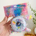 Adorable blue glitter donut squishy toy with colorful heart and flower sequins - Donut Blue
