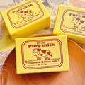 Rectangular yellow butter squishy toy with cute cow print and Pure Milk text label - Butter Cow Brick