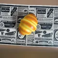 Detailed macro view of realistic slow rebound PU croissant bread toy for stress relief - Mini Croissant Style