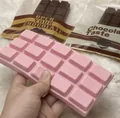 Rosa schokoladenförmiges Slow-Rebound-Quetschspielzeug zum Stressabbau und Sensorik-Spiel - Rosa Schokoladenriegel