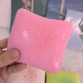 Close-up of a pink toast squishy toy featuring a slow rebound and moist glossy texture - Purple Yam Toast
