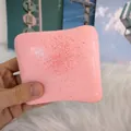 Detail view of pink cheese toast squishy toy with slow rebound for stress relief - Strawberry Toast