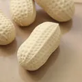 Realistic peanut-shaped squishy toy for stress relief with slow rebound texture. - Peanut Shape / Beige