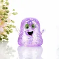 Macro detail of a purple glittery ghost squishy stress toy for Halloween decoration - Purple Ghost Squishy