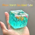 Cubo antiestrés translúcido azul turquesa con decoraciones de conchas marinas - Concha Oceánica Cubo Maltosa