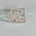 Christmas themed transparent maltose ice cube squishy toy with Santa and snowflake patterns - OPP Bag / Red Hat