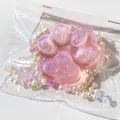 Soft and pink glittery cat paw squishy toy for stress relief with decorative white pearls - Pink Crystal Cat Claw