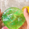 Green translucent glitter maltose squishy toy in plastic bag for stress relief fun - 6cm / Green