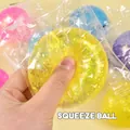 Translucent yellow maltose squishy toy with gold glitter for sensory stress relief - 6cm / Yellow