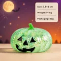 Green glittery translucent pumpkin squishy toy for Halloween stress relief and sensory play - Pumpkin Head / Green