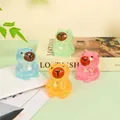 Juego de cuatro coloridos juguetes antiestrés Capybara con purpurina para decoración - 7.5*5cm / Capibara de Maltosa